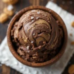 Decadent Chocolate Peanut Butter Swirl Ice Cream in a wooden bowl